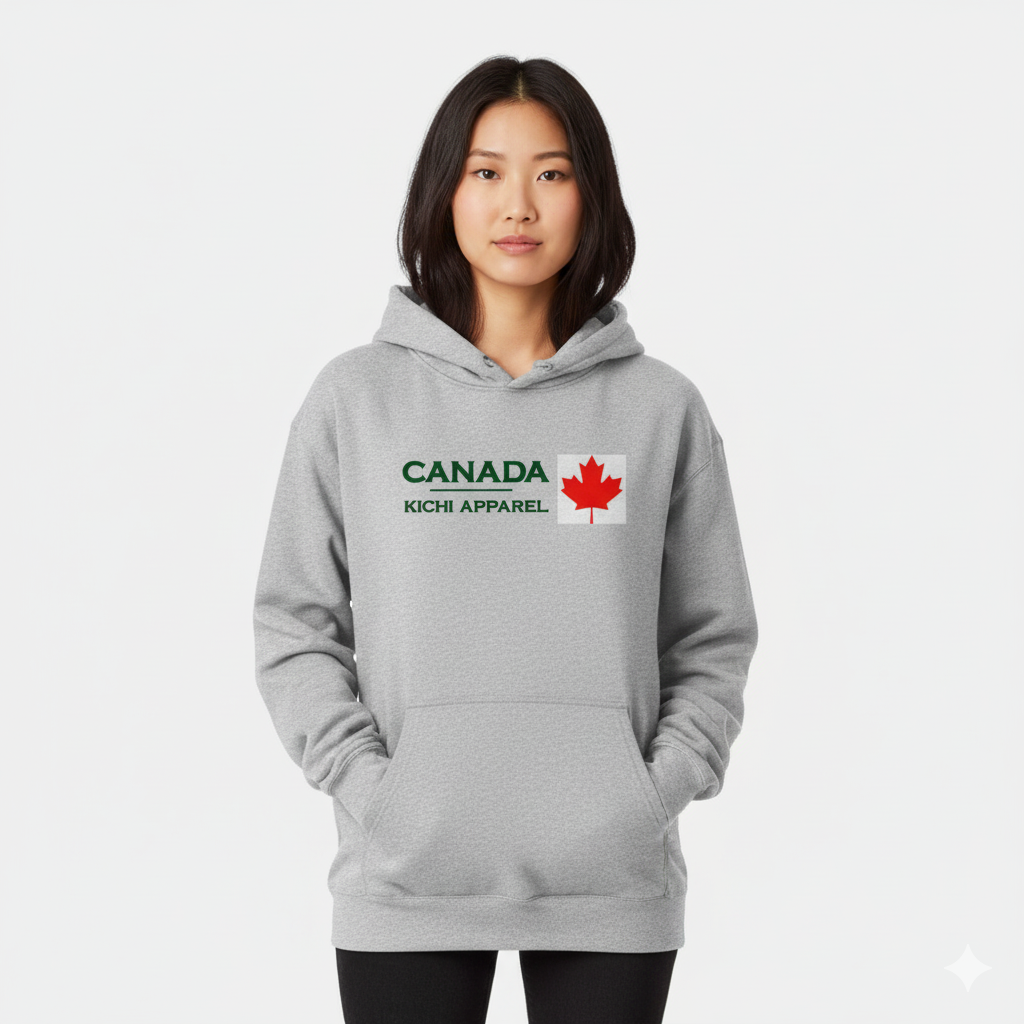 Person wearing a gray hoodie with 'Canada' and 'Kichi Apparel' text on a white background